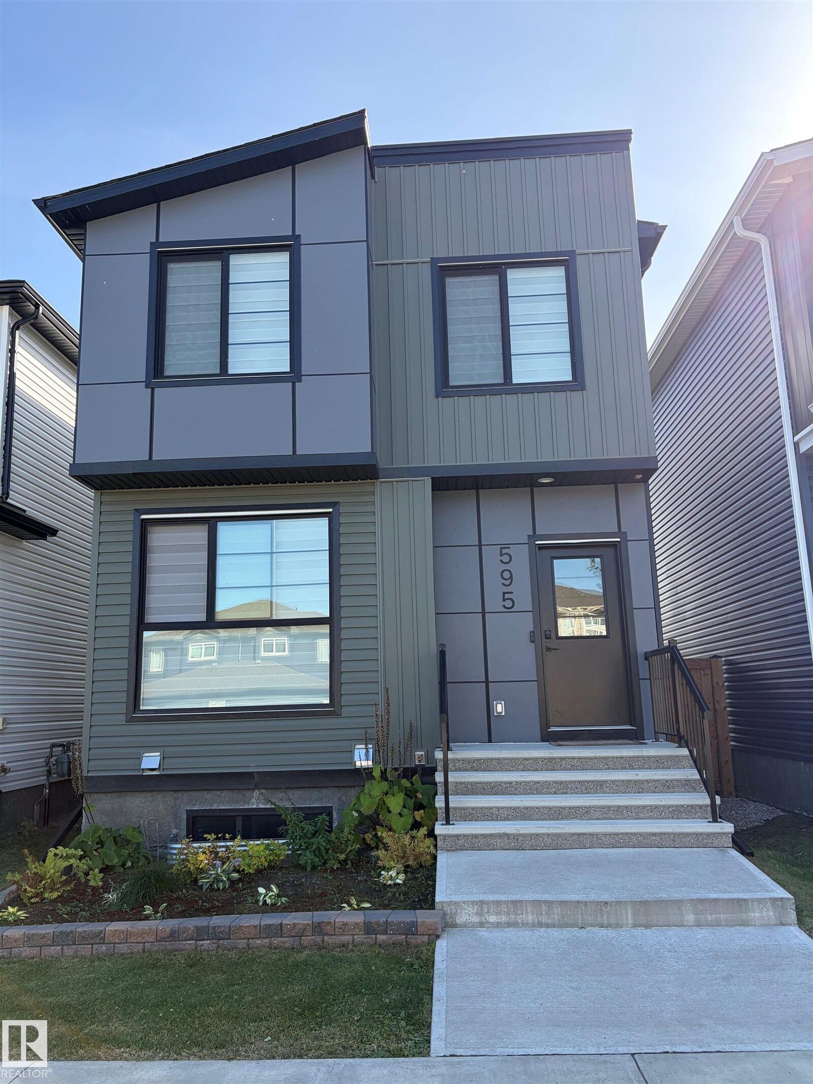 Property Photo:  595 Meadowview Drive  AB T8L 0X1 
