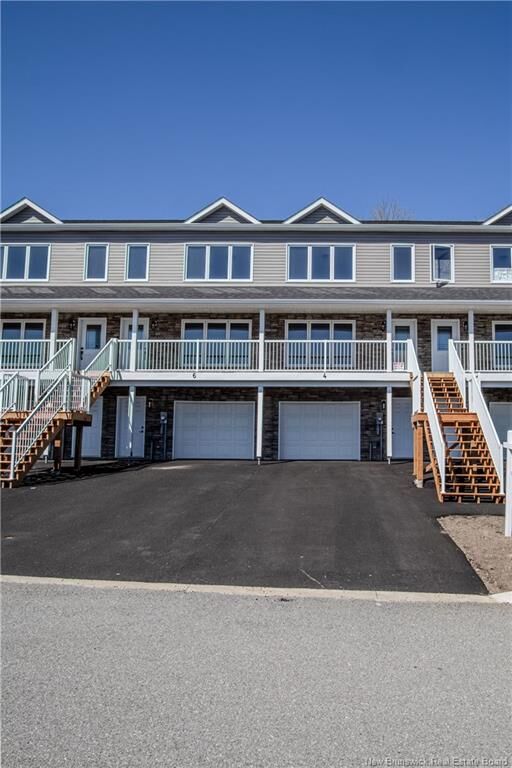 Property Photo:  4 Rockingstone Drive  NB E2M 0B5 