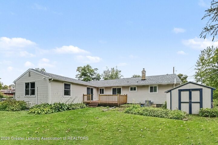 Property Photo:  117 Woodhaven Drive  MI 48917 
