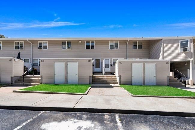 Property Photo: 62 Townhouse Road N 62 NY 11746