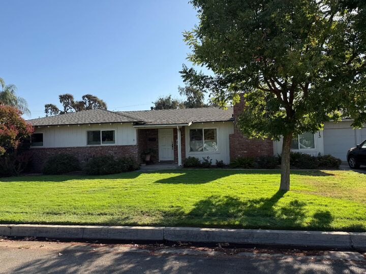 Property Photo:  213 Hilton Street  CA 93637 