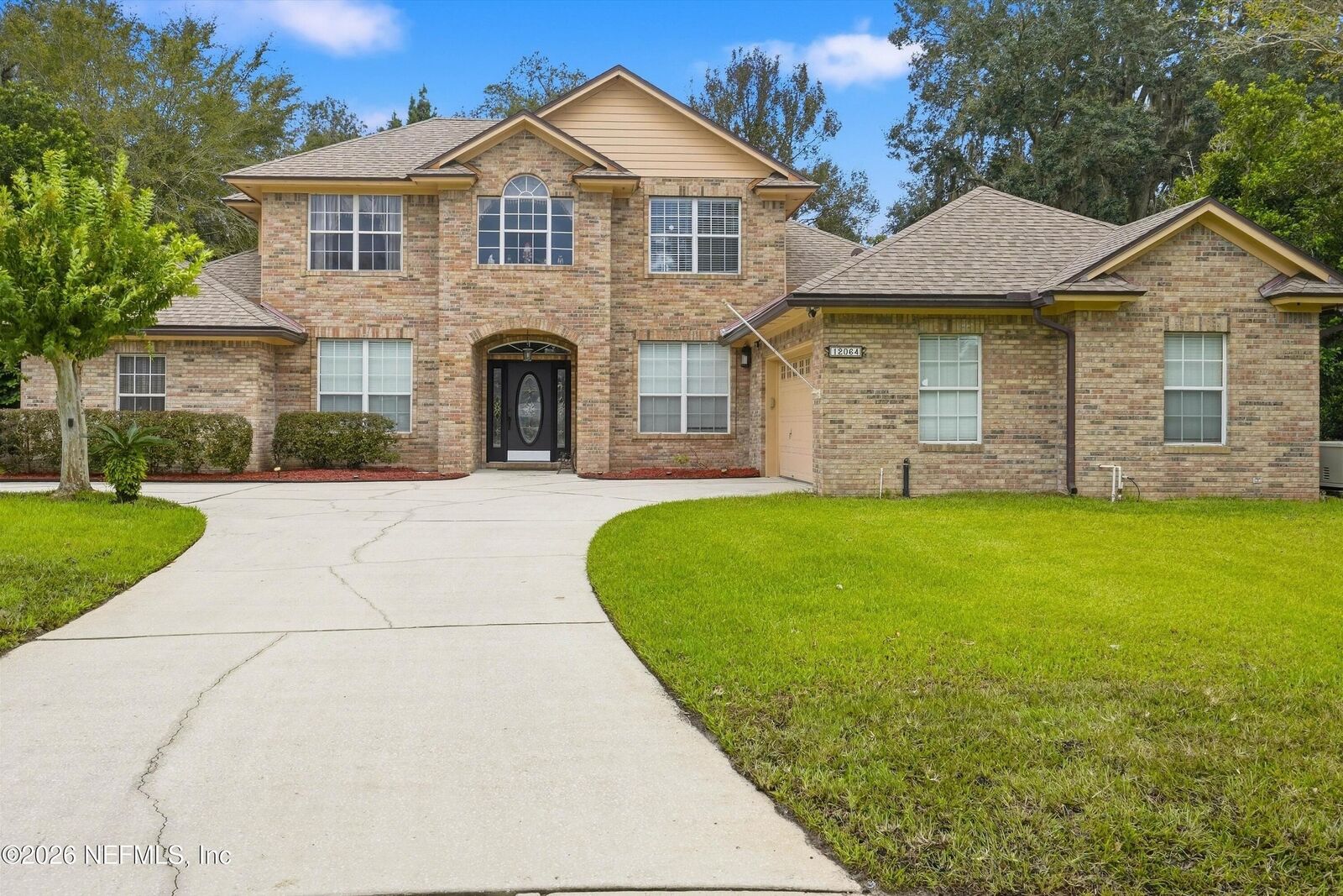 Property Photo:  12064 Rising Oaks Court  FL 32223 