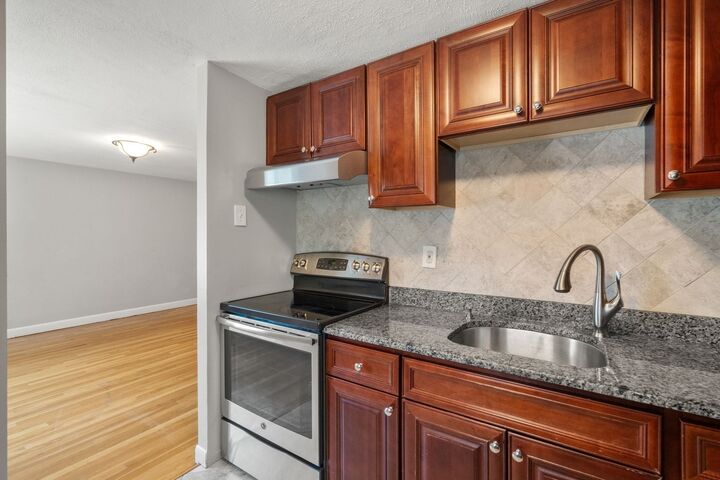 Property Photo:  133 Beaconsfield 44  MA 02445 