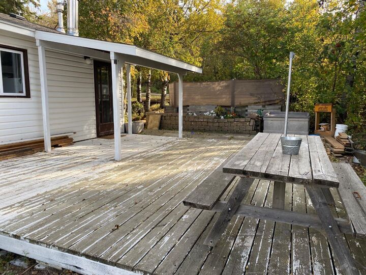 Property Photo:  313 Minnewaukan Road  AB T4V 2M9 