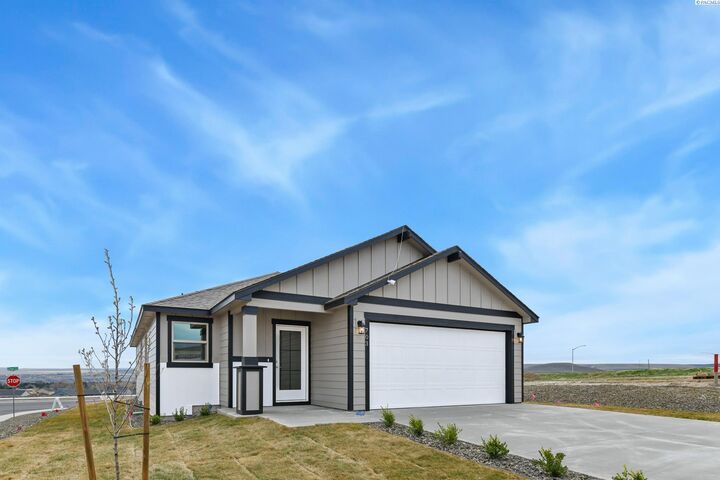 Property Photo:  703 Honeylicious St  WA 99352 