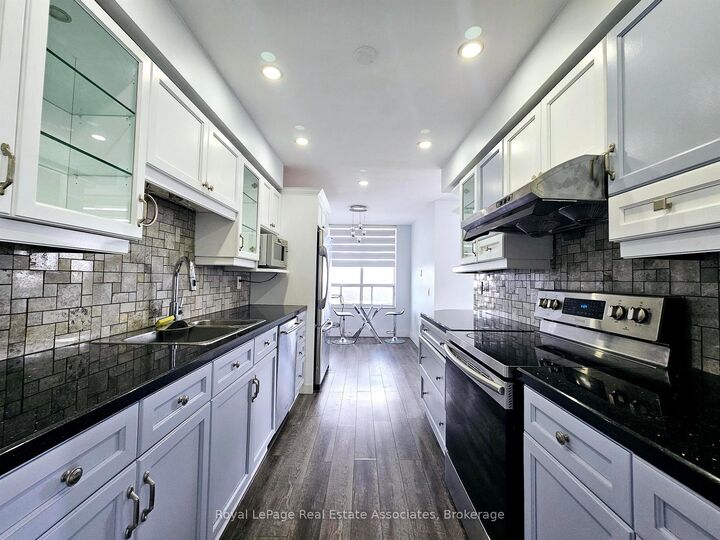 Property Photo: 25 Kingsbridge Garden Circle 2425 ON L5R 4B1
