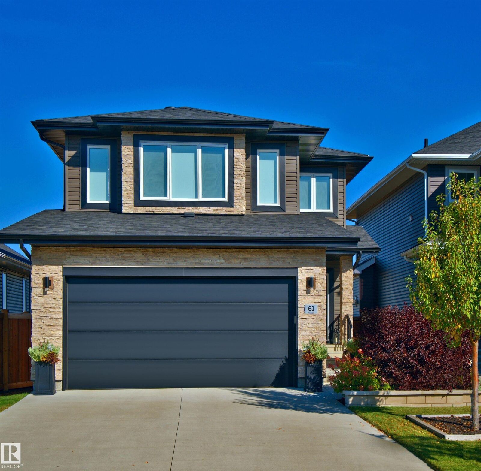 Property Photo:  61 Encore Crescent  AB T8N 7W2 