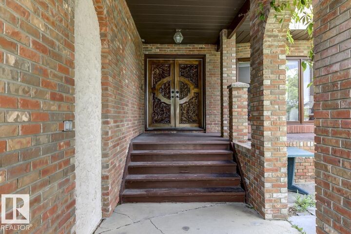 Property Photo:  6819 10 Av NW  AB T6K 2T9 