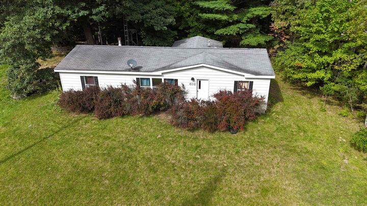 Property Photo:  616 W Houghton Creek Road  MI 48654 