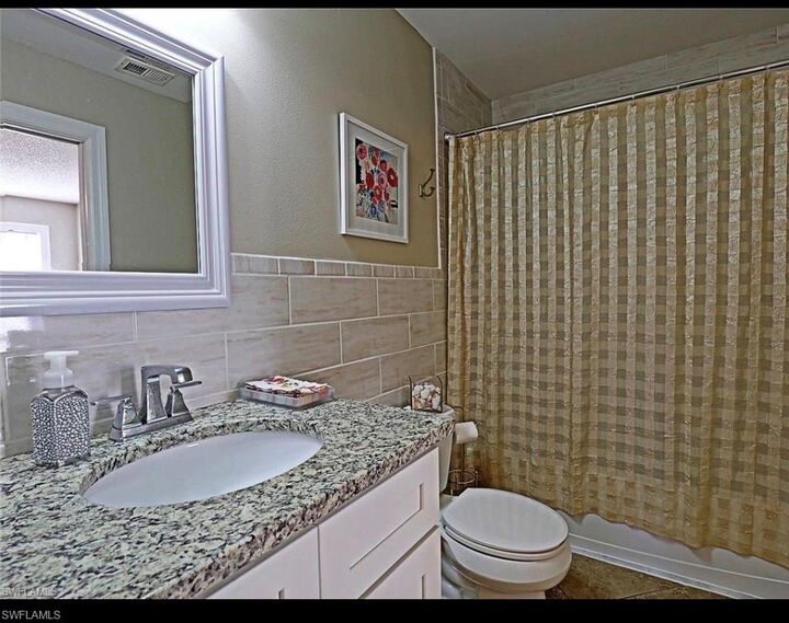 Property Photo:  6310 Royal Woods Dr  FL 33908 