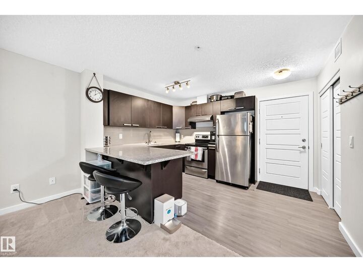 Property Photo:  #115 14808 125 St NW  AB T5X 0G1 
