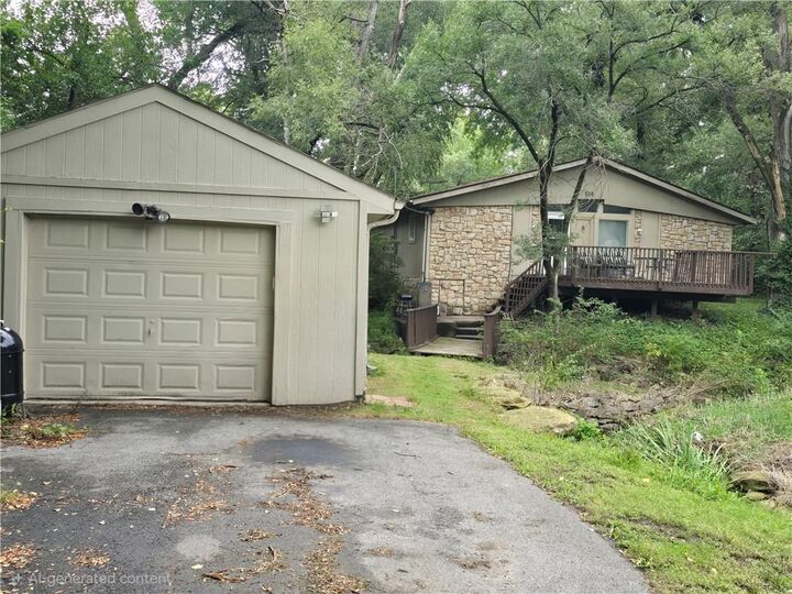 Property Photo:  506 NE 114th Terrace  MO 64155 
