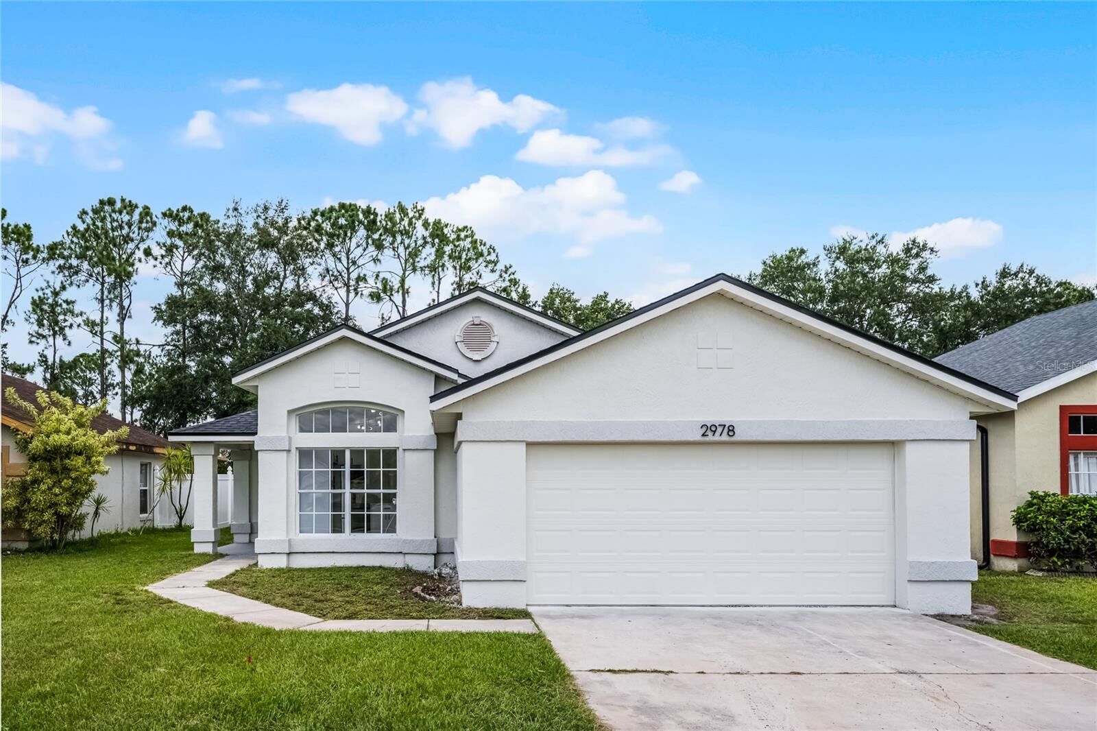 Property Photo:  2978 Stillwater Drive  FL 34743 