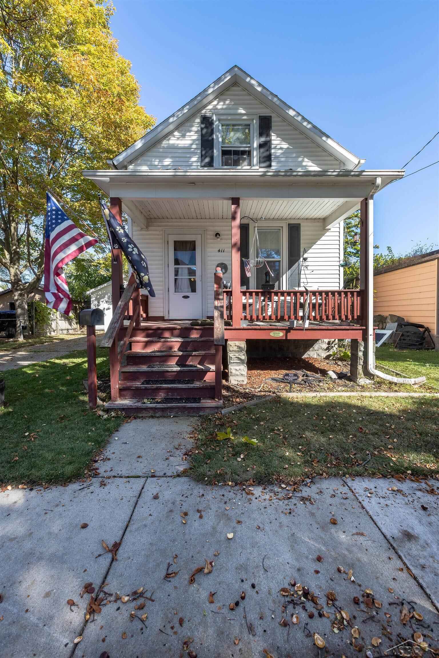 Property Photo:  411 S Jackson Street  MI 48708 