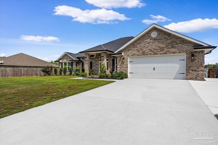 Property Photo:  9741 Shangri La West Rd  FL 32583 