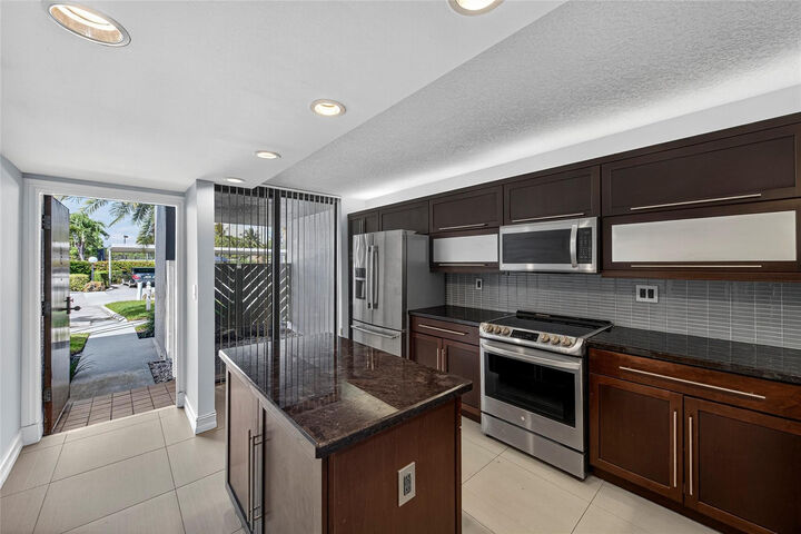 Property Photo:  1100 SE 5th Court 53  FL 33060 