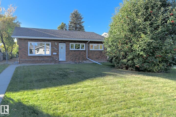 Property Photo:  13028 134 Street NW  AB T5L 1V8 