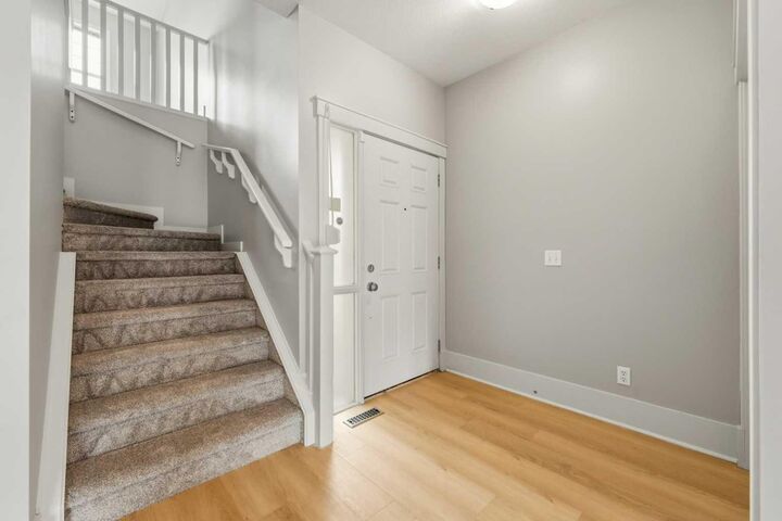 Property Photo:  16 Cougartown Place SW  AB T3H 0A2 