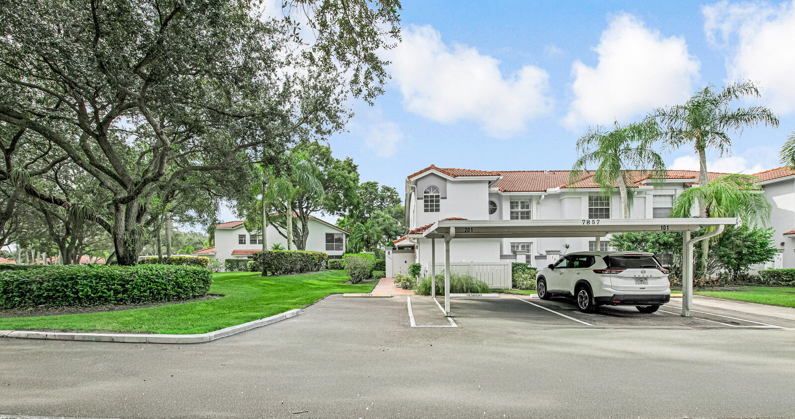 Property Photo:  7857 Whispering Palms Drive 201  FL 33437 