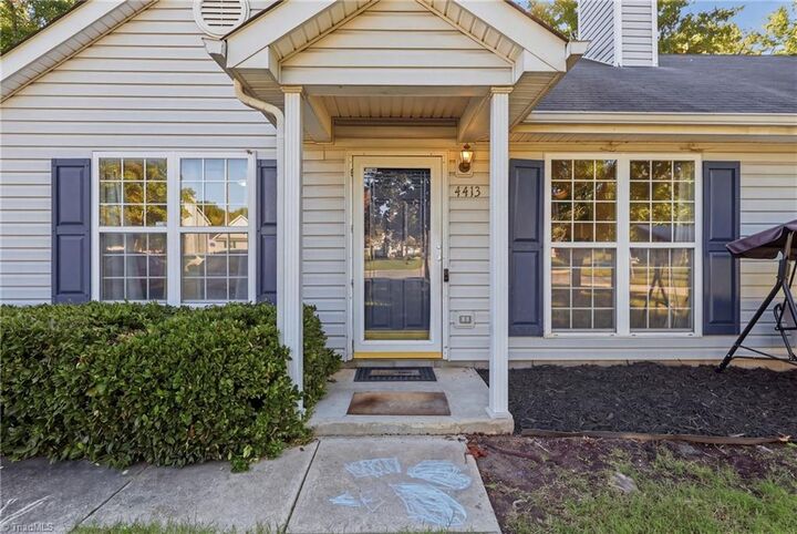 Property Photo: 4413 Bear Ridge Court NC 27406