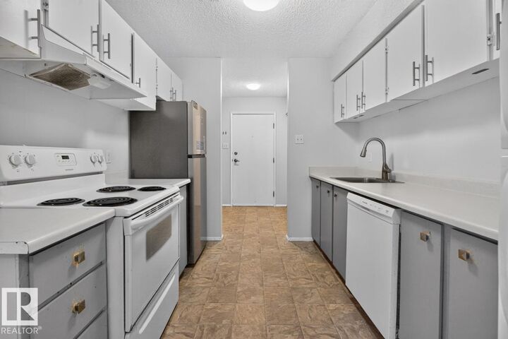 Property Photo:  237 Woodvale Road NW  AB T6L 1G7 