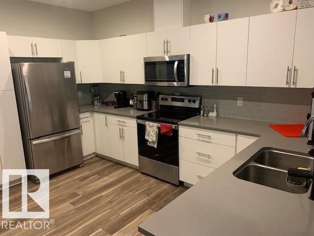 Property Photo:  1051 Graydon Hill Boulevard SW 19  AB T6W 3C8 