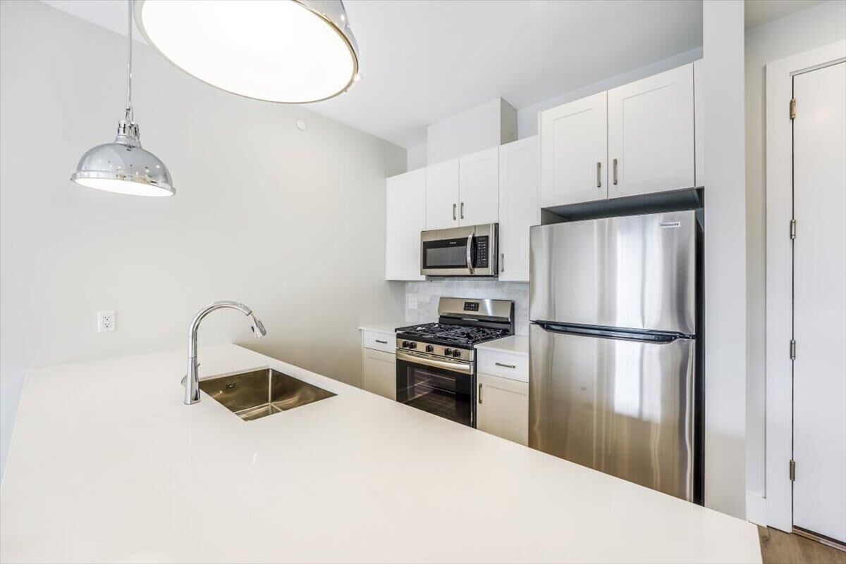 Property Photo: 667-665 Grand St 406 NJ 07304