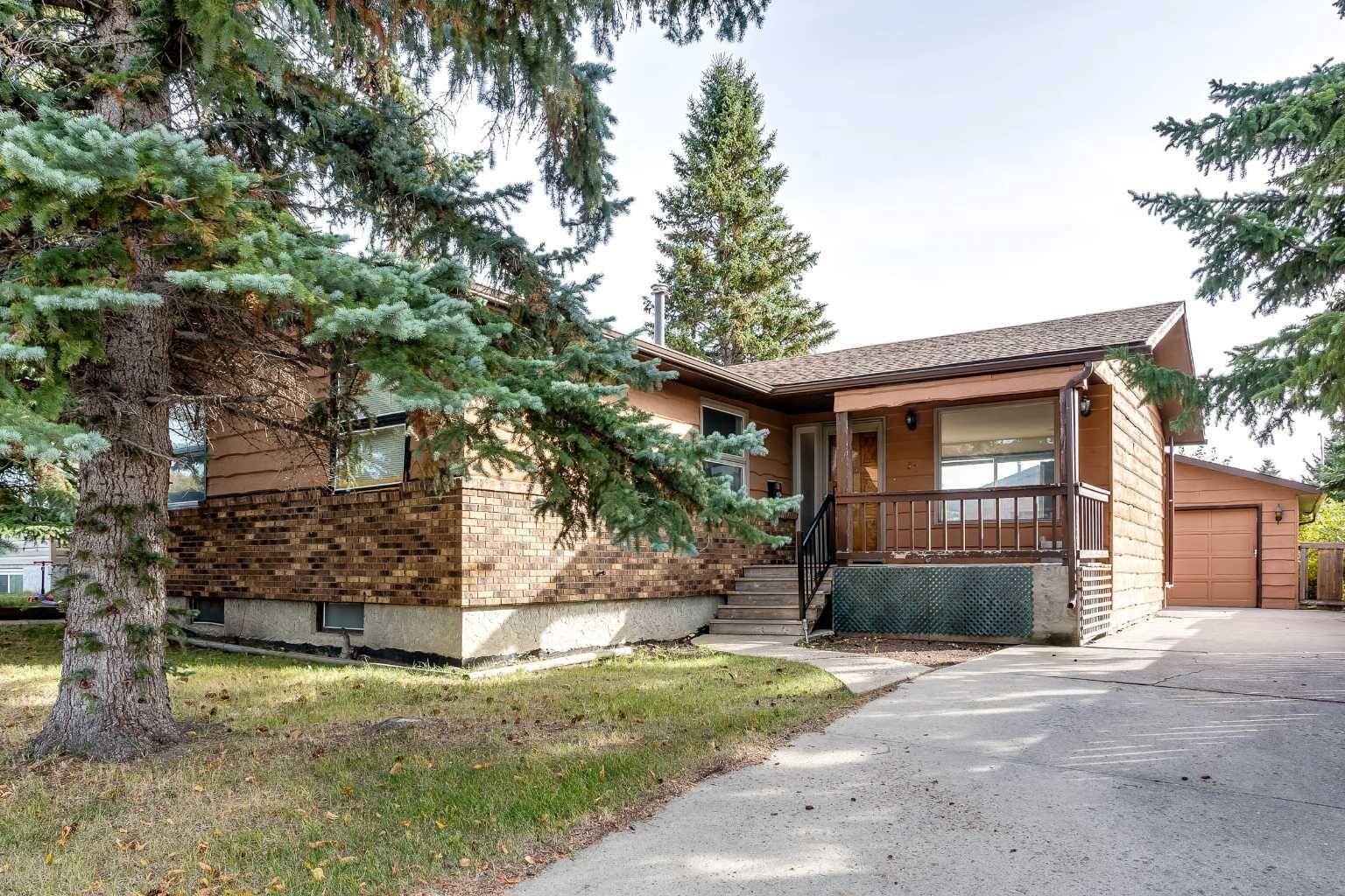 Property Photo:  57 Big Springs Drive SE  AB T4A 1N6 