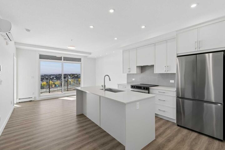 Property Photo:  1802 Mahogany Boulevard SE 6411  AB T3M 4A5 