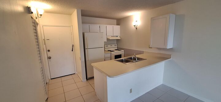 Property Photo:  2771 Riverside Drive 415-A  FL 33065 