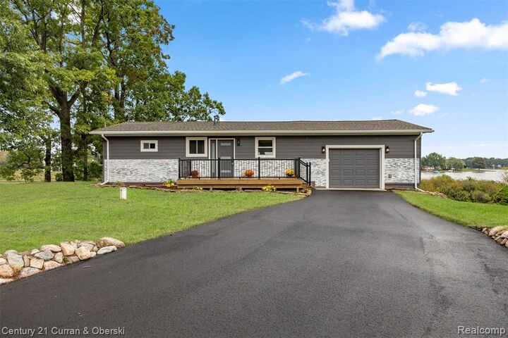 Property Photo:  10991 Tacoma Drive  MI 49249 