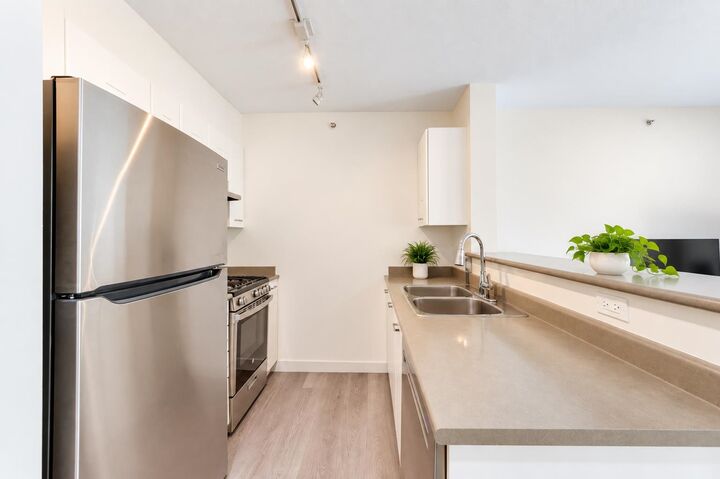 Property Photo:  3438 Vanness Avenue 205  BC V5R 6E7 