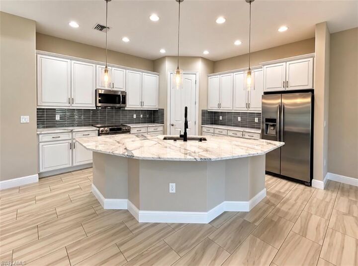 Property Photo:  12725 Astor Pl  FL 33913 