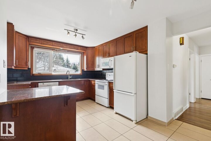 Property Photo:  11451 48 Avenue NW  AB T6H 0C9 