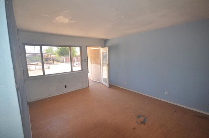 Property Photo:  5941 Eucariz Avenue SW  NM 87121 