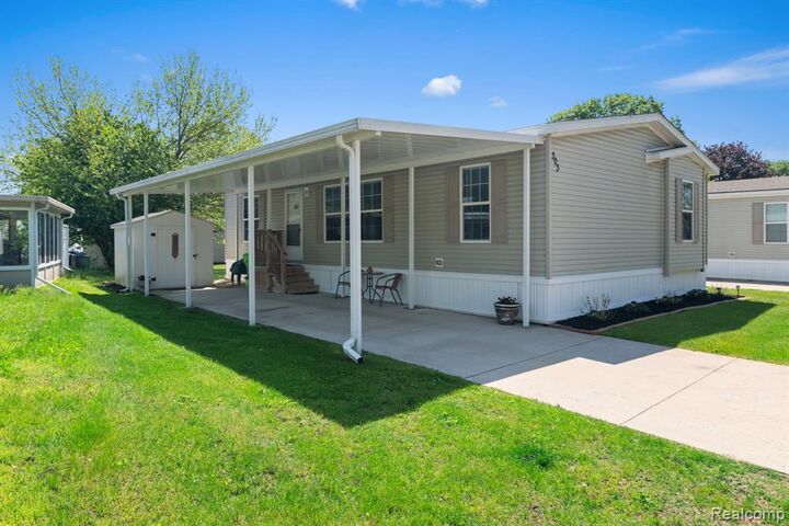 Property Photo: 303 Toucan Street MI 48309