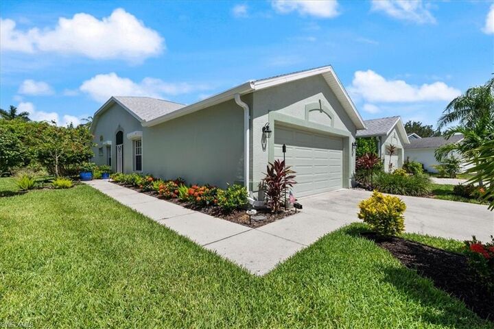 Property Photo: 5485 Whitten Dr FL 34104