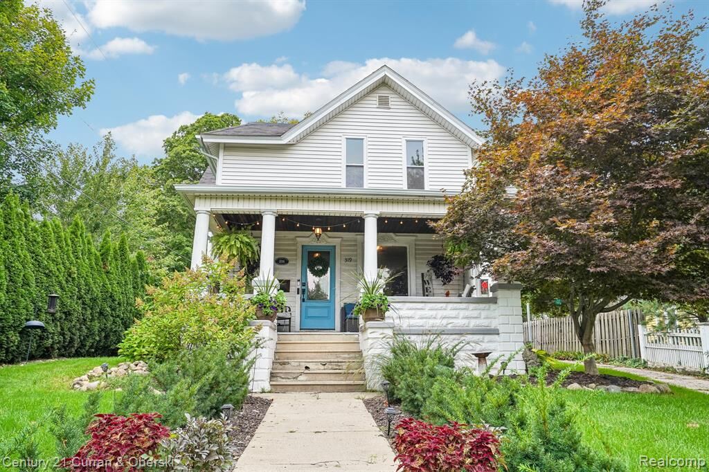 Property Photo:  319 E Commerce Street  MI 48381 