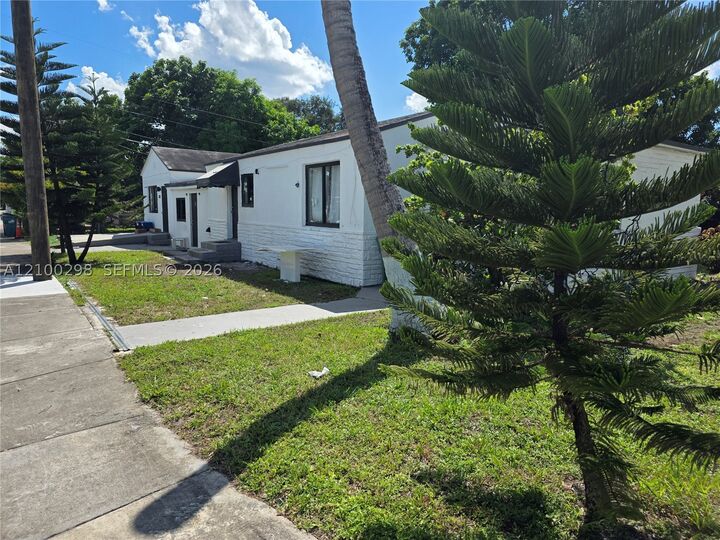 Property Photo: 1102 NW 103rd St FL 33150