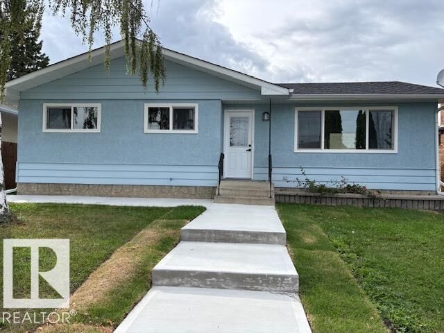 Property Photo:  13812 63 Street NW  AB T5A 1R3 