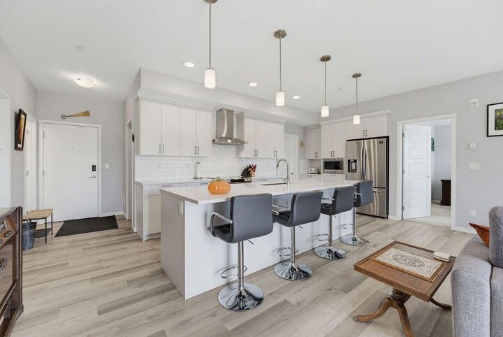 Property Photo:  300 Harvest Hills Place NE 204  AB T3K 2P4 