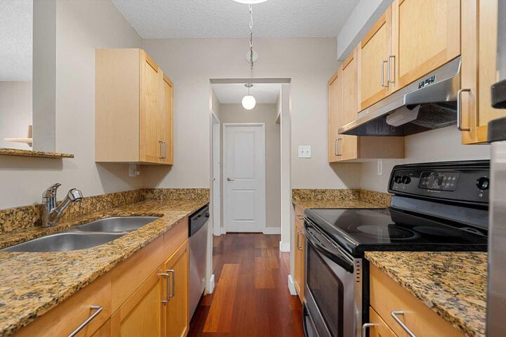 Property Photo:  315 9A Street NW #404  AB T2N 1T7 