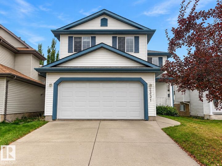Property Photo:  2331 37B Avenue NW  AB T6T 1N9 