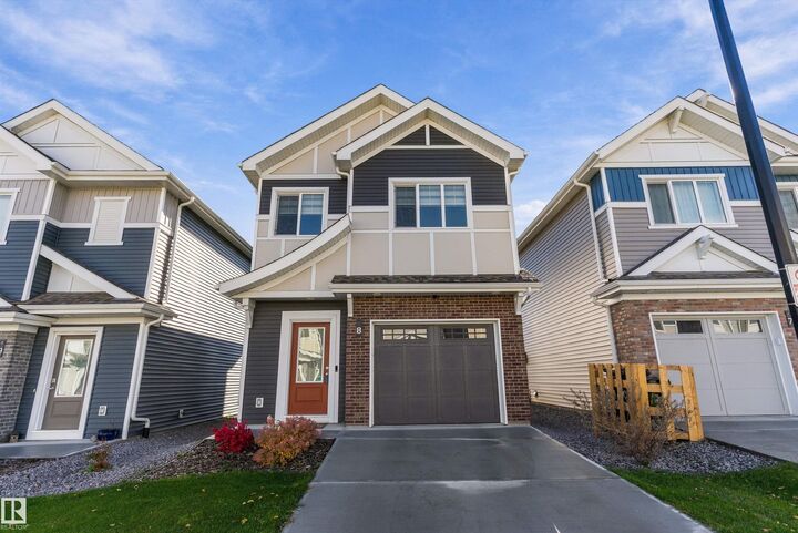 Property Photo:  13119 209 Street NW 8  AB T5S 0R4 