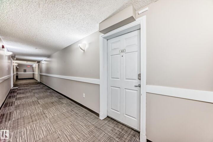 Property Photo:  6925 199 Street NW 411  AB T5T 3X8 