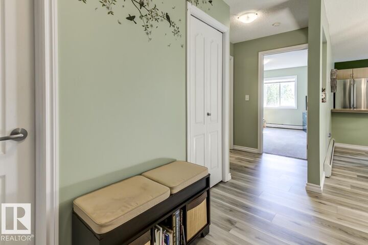 Property Photo: 905 Blacklock Way SW 214 AB T6W 1M7