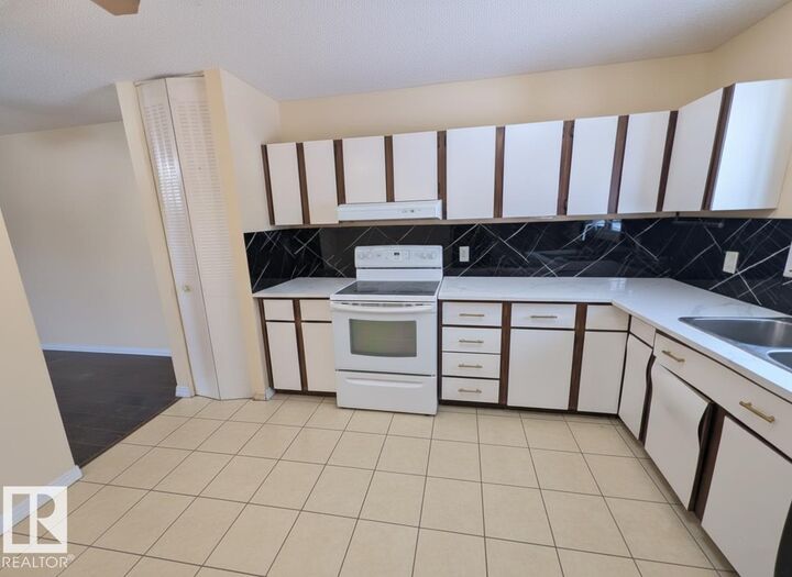 Property Photo:  46 McLeod Place NW  AB T5A 3A8 