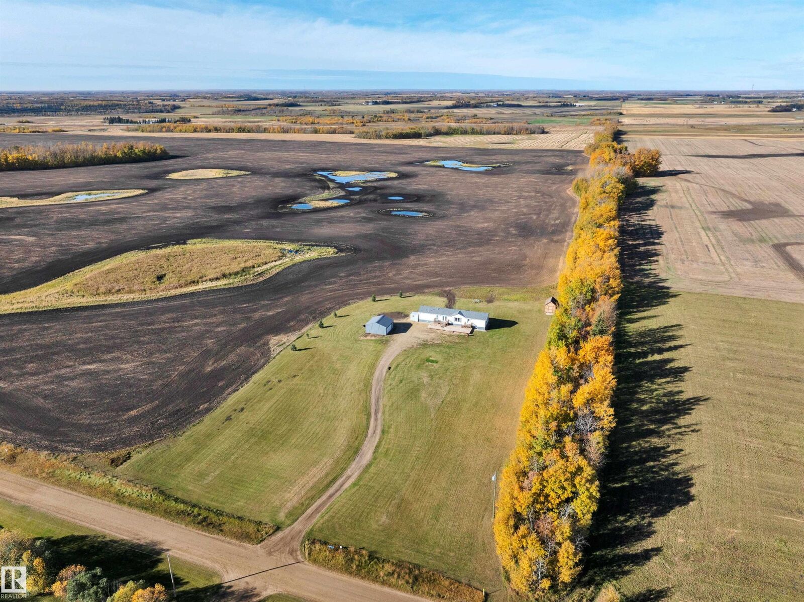 Property Photo:  48138 Rge Rd 244  AB T4X 2S6 
