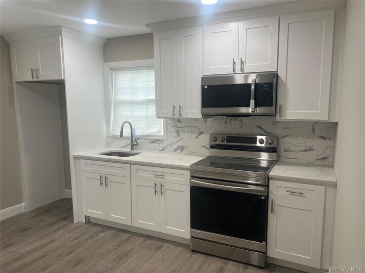 Property Photo:  6 E Booker Avenue  NY 11798 