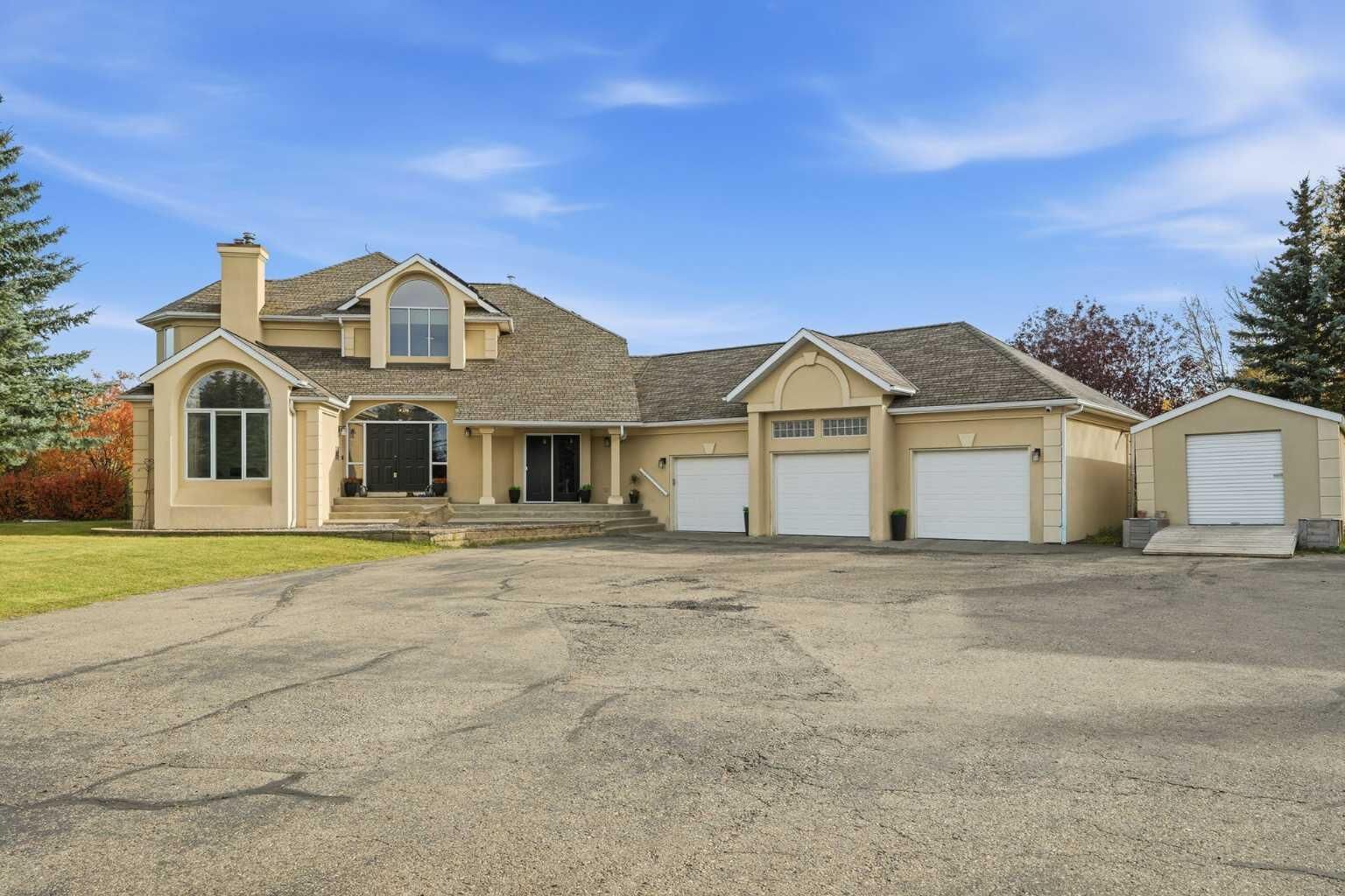 Property Photo:  28 Bearspaw Acres  AB T3R 1H7 